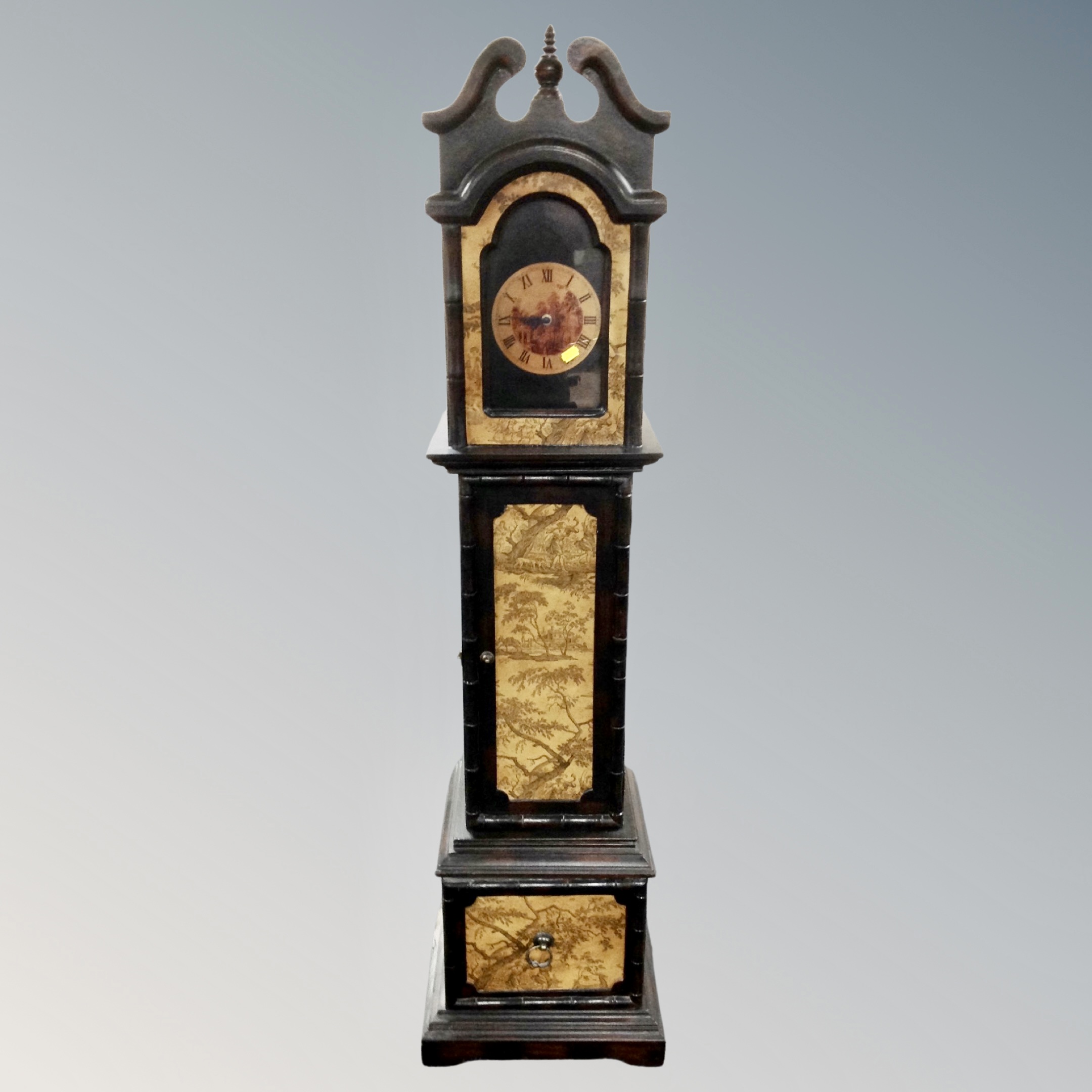 A contemporary cabinet in the form of a granddaughter clock