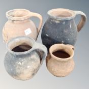 A set of four antique terracotta pots