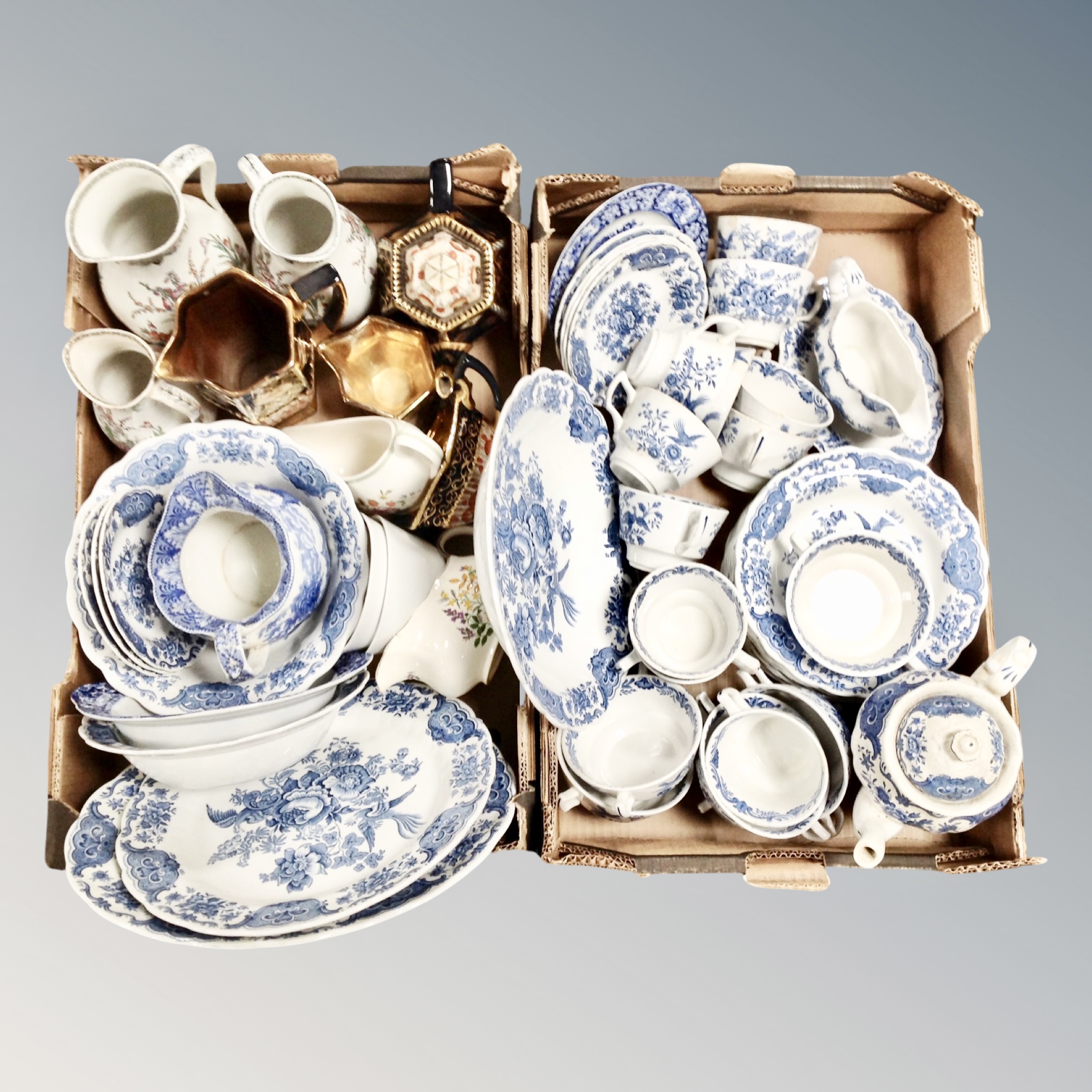Two boxes of antique and later ceramics, Imari tea ware, three graduated jugs,