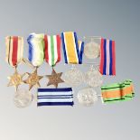 A WWI 1914 - 1918 medal on ribbon together with seven further WWII medals