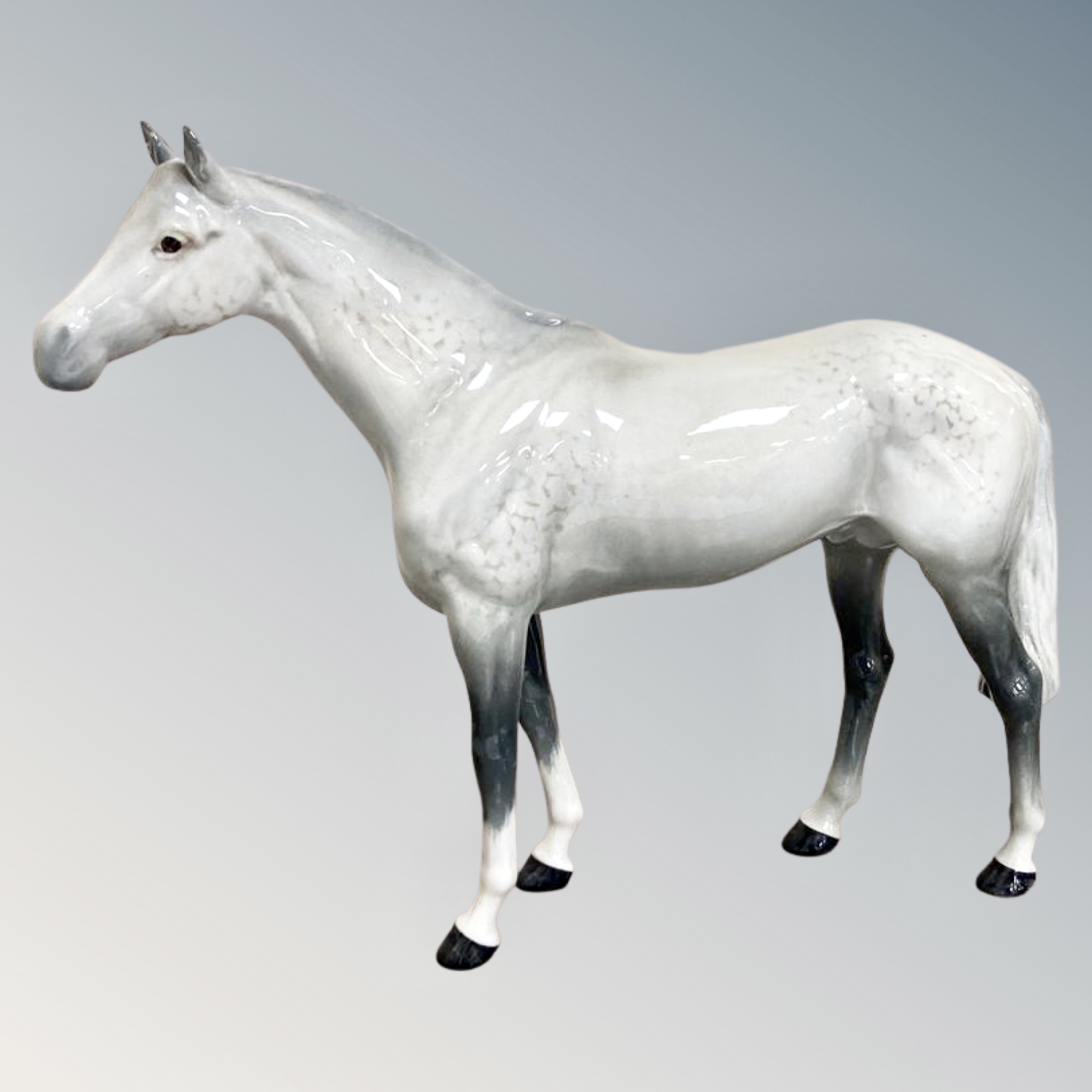 A Beswick figure - Large racehorse, designed by Arthur Gredington, grey gloss, height 28.5 cm.