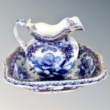 A Victorian floral patterned wash jug and basin