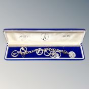 An Avon silver fob chain with charms