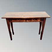 A Next hardwood two tier side table on raised legs