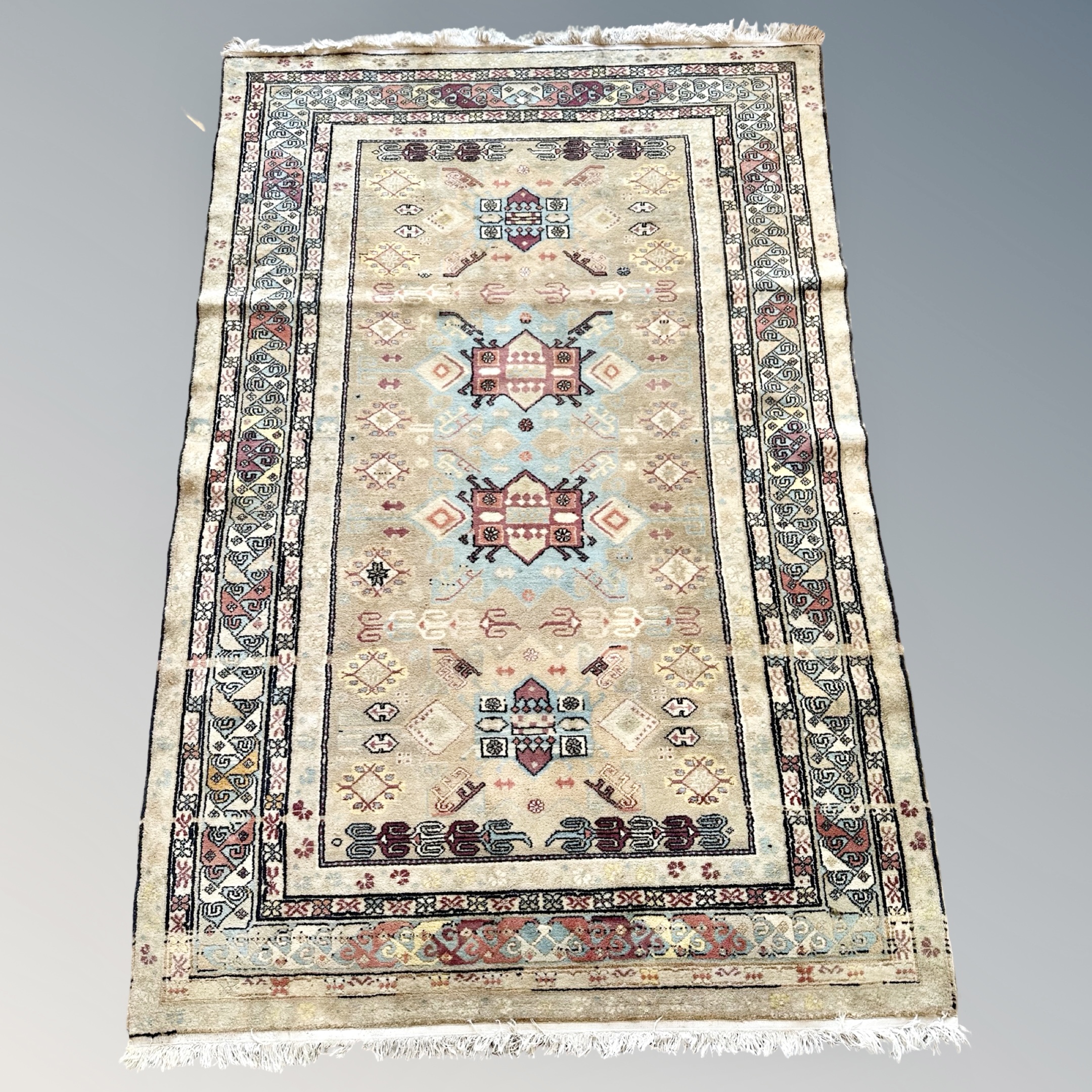 A Caucasian rug,