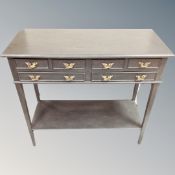 A contemporary six drawer painted console table, 75cm high by 82cm wide by 35cm deep.