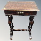 A 19th century work table with under stretcher