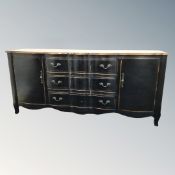 A French style two tone serpentine double door sideboard fitted with three drawers