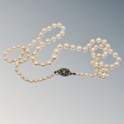 A strap of pearls with marcasite clasp