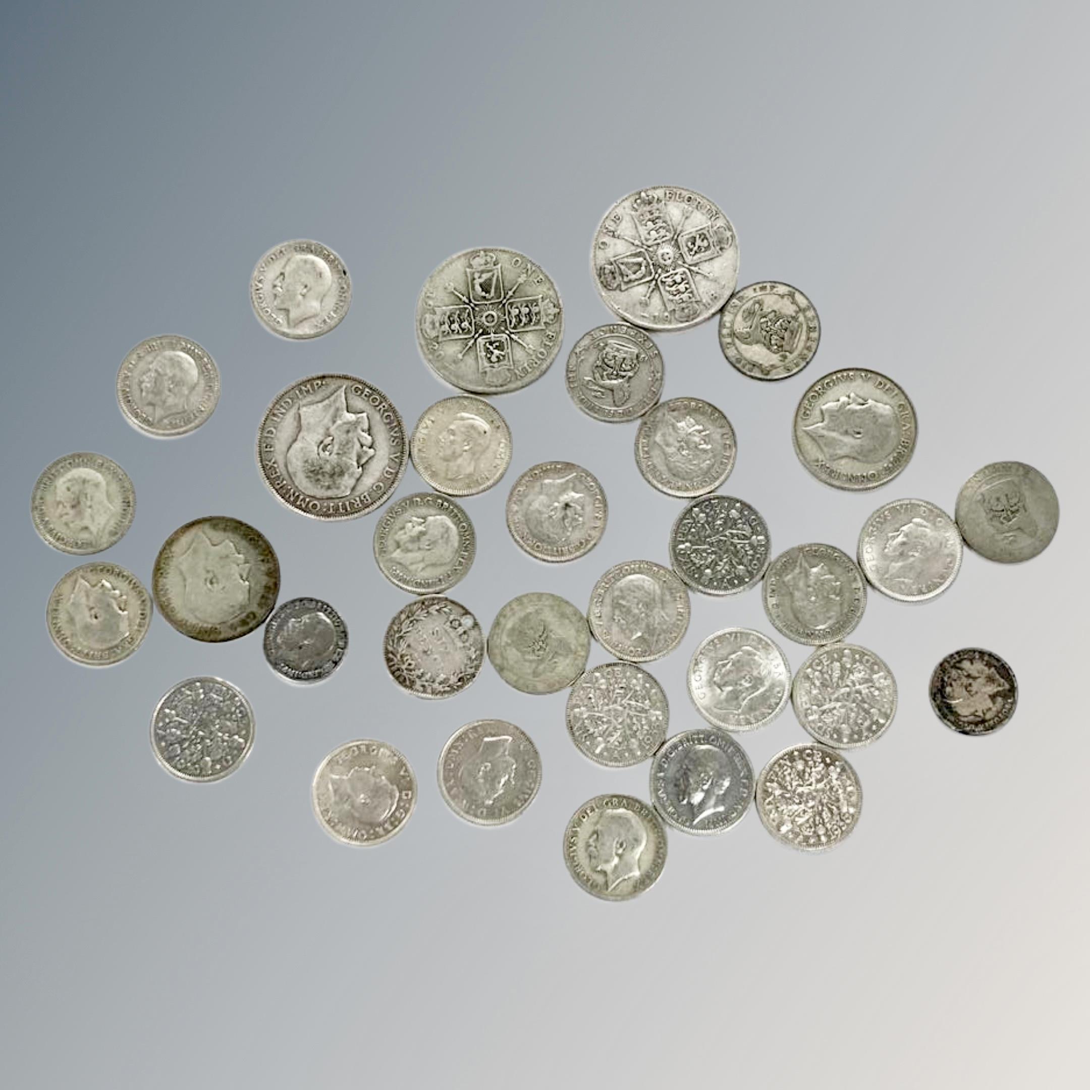 A collection of thirty three silver-grade coins, George V Florins, George V Shillings,