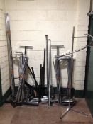 A quantity of metal shop clothes rails and fittings
