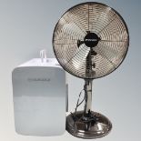 A Bionaire desk fan together with a subcold mini fridge