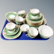 Thirty-six pieces of Crown Staffordshire gilded tea china