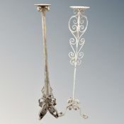 Two wrought metal candle holders