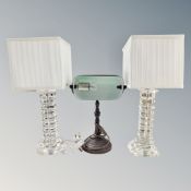 A contemporary banker's lamp with green glass shade together with a further pair of table lamps