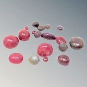 A group of loose rubies totalling 160 carats