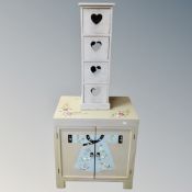 A shabby chic floral painted double door low cabinet together with further painted narrow four