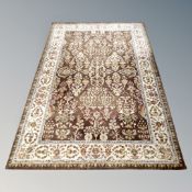 A machine-made oriental design rug,