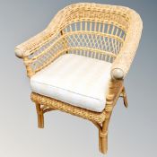 A bamboo and wicker conservatory armchair