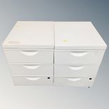Two three drawer filing chests with wheels