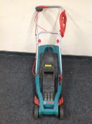 A Bosch rotak 34GC 1400W electric lawn mower with grass box and lead
