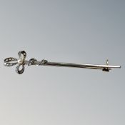 An antique 18ct gold and platinum pearl and diamond pin CONDITION REPORT: 3.
