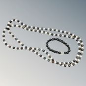 A three-tone cultured pearl necklace, length 114 cm approximately,