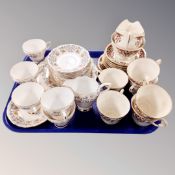A tray of two part bone china tea services,