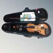 A Stentor student violin and bow in fitted case