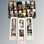A box of twelve ceramic car ornaments together with three Leonardo boxed dolls