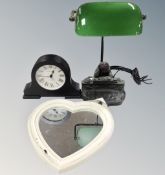 A contemporary figural banker's lamp together with heart shaped mirror and mantel clock