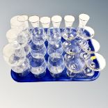 A tray of branded drinking glasses,