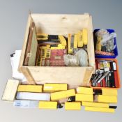 A wooden crate with lid containing Sandik lathe turning tools in cases,
