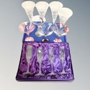 A set of four Edinburgh crystal champagne flutes, boxed,