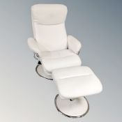 A pair of contemporary chrome framed white leather effect swivel chairs with stools (as found)
