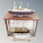 A matchstick model of a tall ship in part glazed display case,