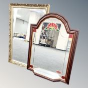 A contemporary shaped leaded glass mirror with shelf in mahogany frame together with traditional