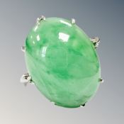 An antique 18ct white gold jade ring,