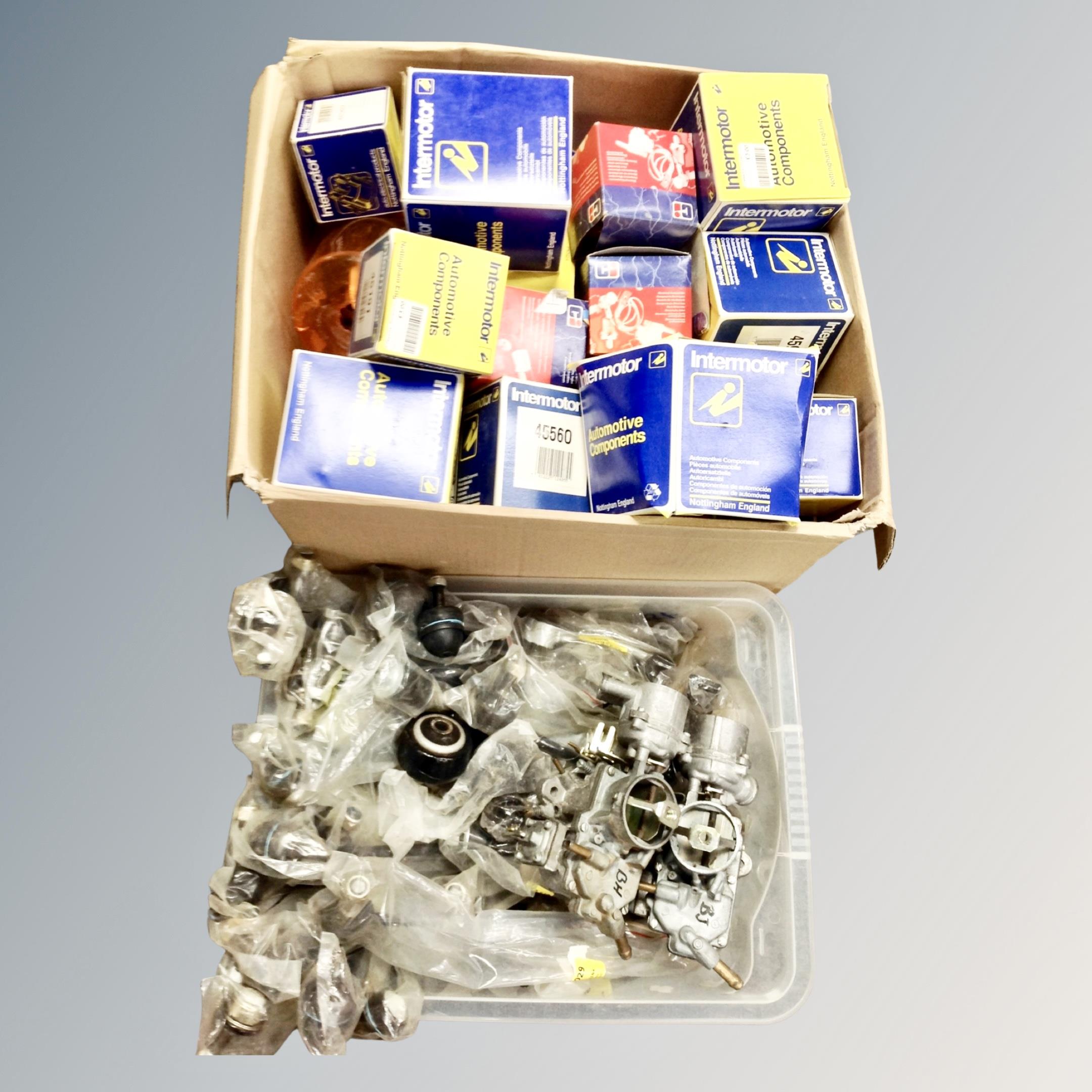 Two boxes of automobile components,
