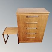 A 20th century teak five drawer chest together with a G-Plan occasional table