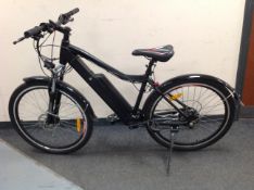 A King Road electric mountain bike with mud guards, LCD display,