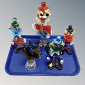 A tray of Murano glass clowns and further glass fish ornament
