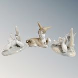 A Lladro figure of a Donkey with flower together with two Nao duck groups