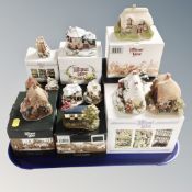 A tray of eleven Lilliput Lane ornaments, boxed.