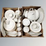 Two boxes of Polish white and gilt porcelain tea and dinner ware