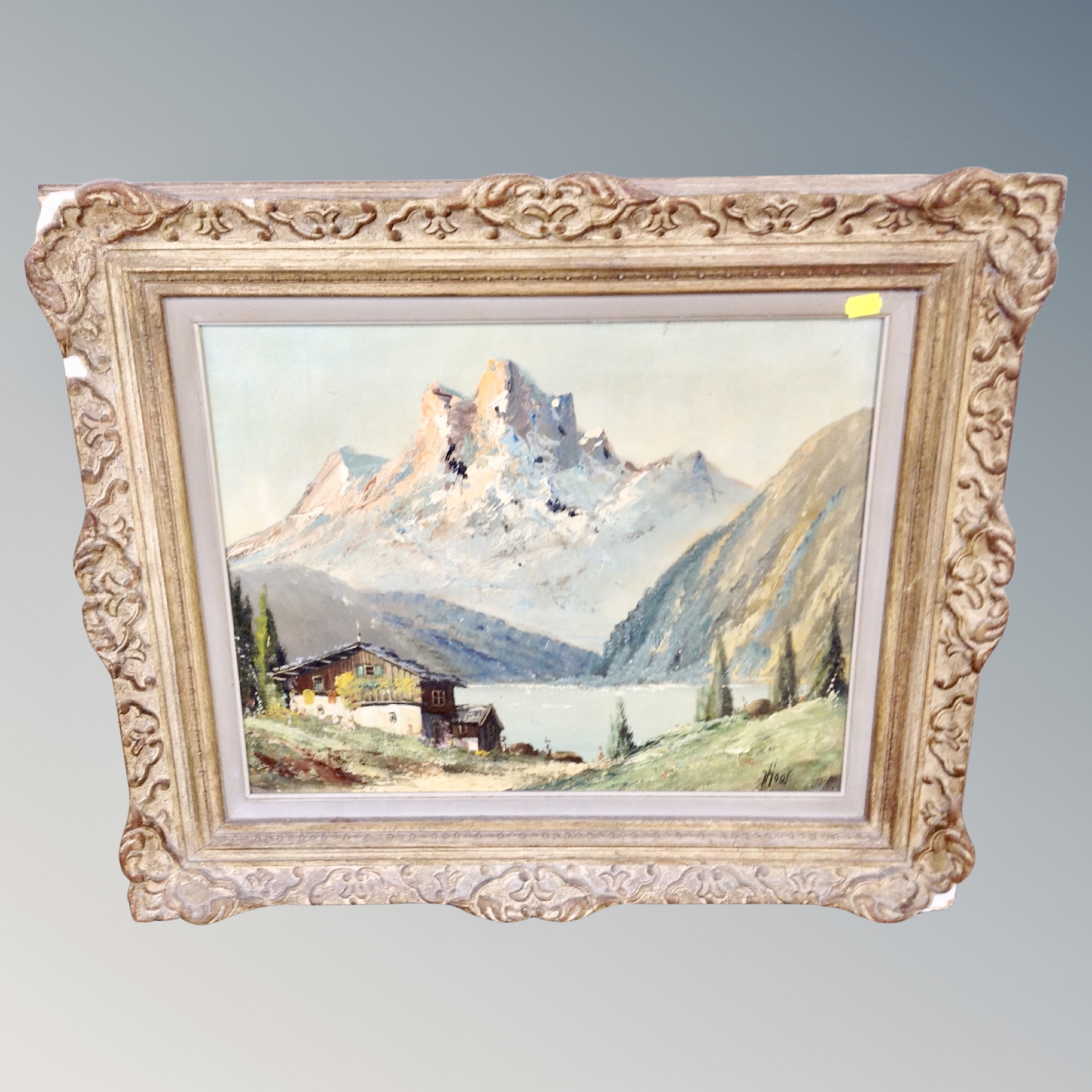 A continental oil on canvas - chalet with lake and snow capped mountains CONDITION