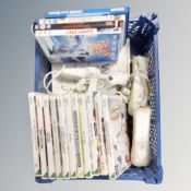 A box of eleven Nintendo Wii games, controllers and nunchucks,