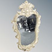 A contemporary Rococo style wall mirror