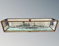 A hand built scale model of the British WWII battleship HMS Hood, in glazed display case,