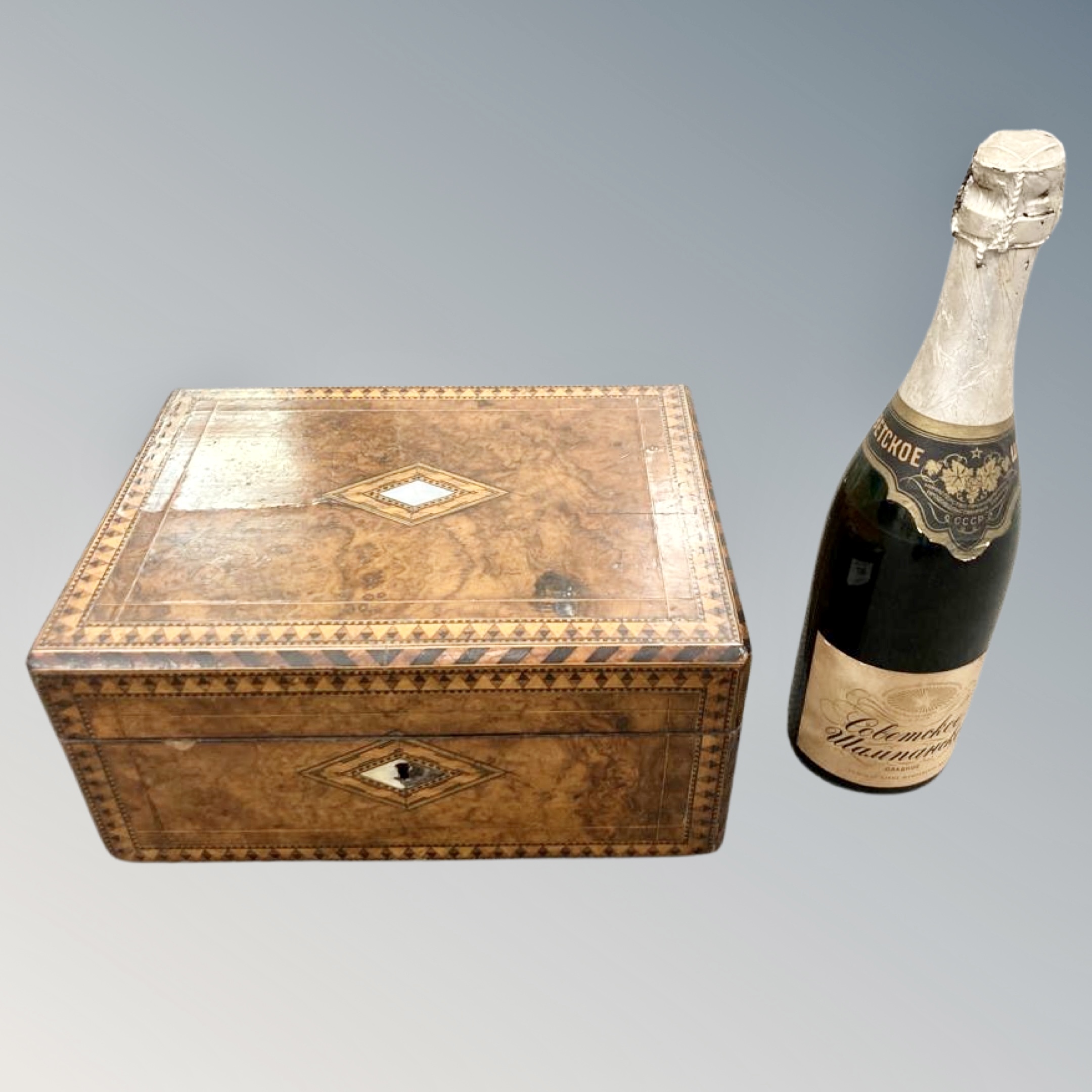 A Victorian inlaid walnut jewellery box together with One bottle of Cobetckoe Polish Sparkling